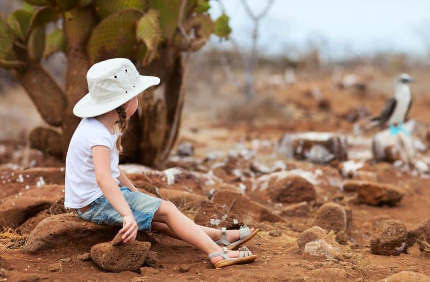Child enjoying the Galapagos islands with family