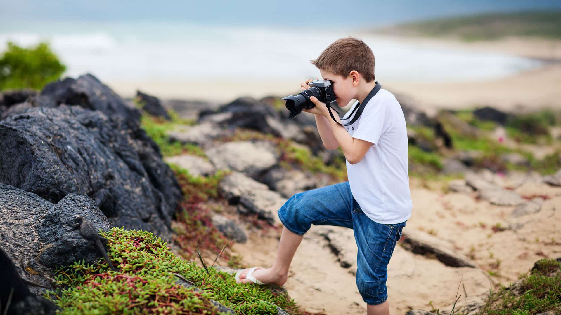 Child enjoying the Galapagos islands with family